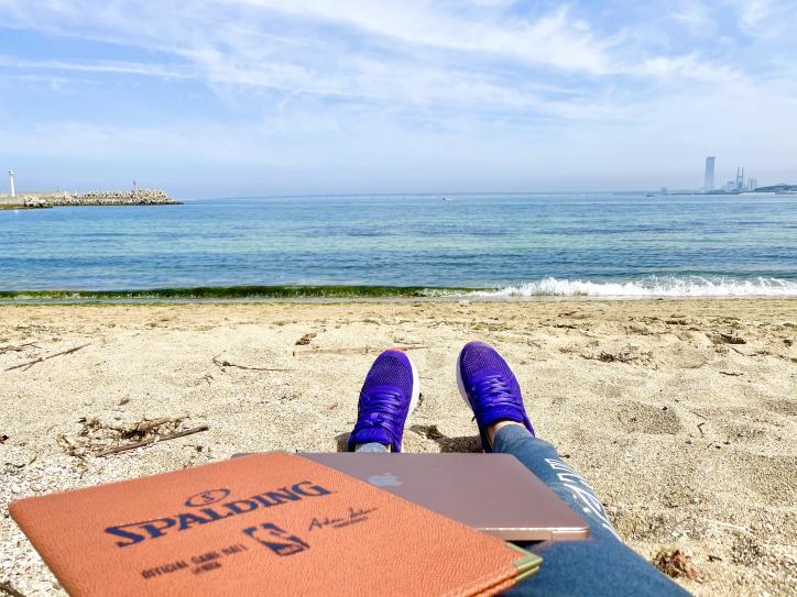 <font color='blue' size='2'>Relaxing on the beach. It was a little warm spring day and soft sand was comfortably holding my body. </font>