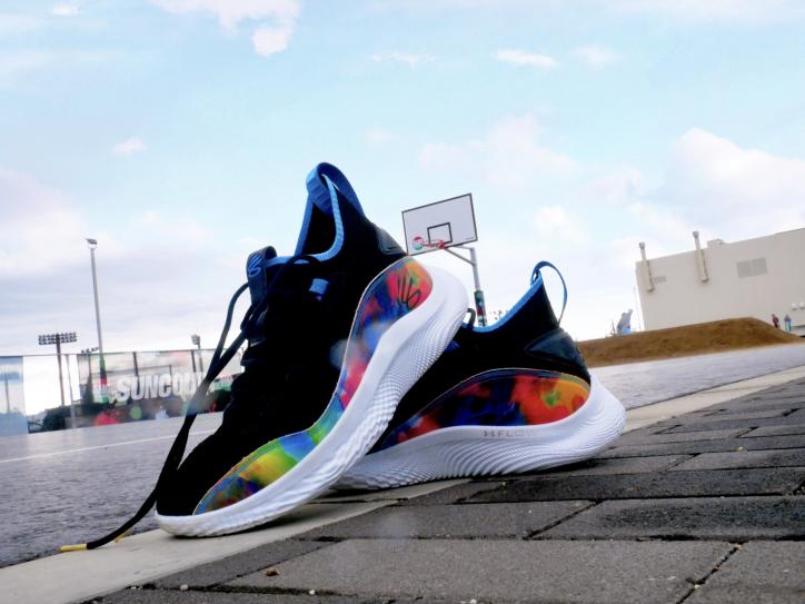 <font color='blue' size='2'>His favourite pair out of his basketball shoes collection! He was wiping the sole carefully after photo shoot.</font>